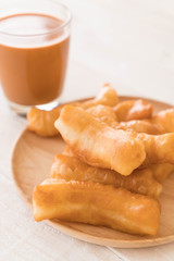 deep-fried dough stick with milk tea