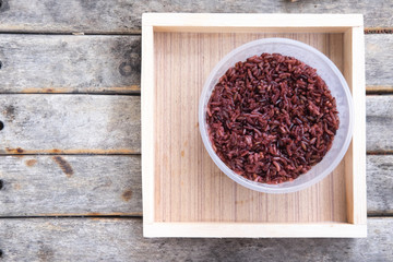 Cooked rice berry on wooden plate, Ready to eat, Eat clean conce