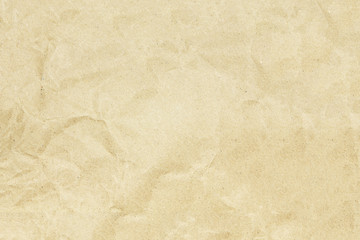 Recycled crumpled brown paper texture or paper background for design with copy space for text or image.