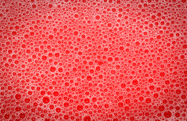detergent foam bubble with red tone for background