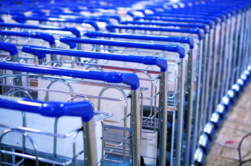 row of luggage trolley at the airport