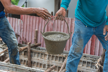 Concrete pouring during commercial concreting floors of buildings in construction(Commercial Building)