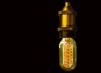 Tungsten light bulb glowing in isolated