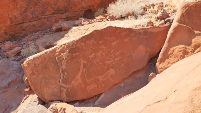 one of the largest concentrations of rock petroglyphs in Africa, ancient rock engravings in  Namibia world heritage