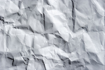 Obraz premium Crumpled paper isolated on a black background.