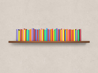 Bookshelf with colorful books on the wall