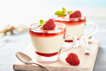 Panna cotta with rasperry and mint  topping with strawberry sauce