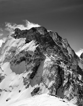 Fototapeta Black and white on winter snow mountain