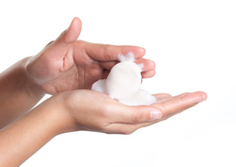 Shave foam (cream) on woman's hands