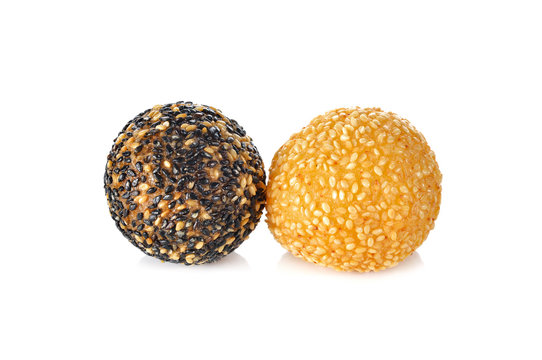 fried mung bean with white and black sesame ball on white backgr