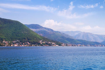 Fototapeta na wymiar Old small town on sea coast. Herceg Novi - coastal town in Montenegro located at the entrance to the Bay of Kotor. Tourist travelling attraction