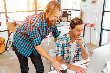 Two office workers at the desk