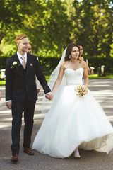 Bride and groom in the park