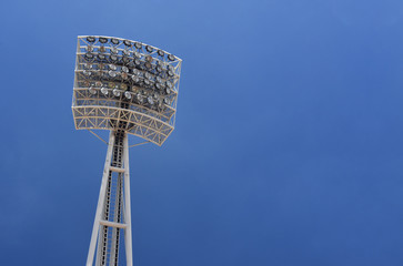 Spotlight at Stadium with Blue Sky Background