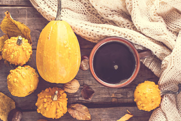 &Ntilde;up of coffee, pumpkin, autumn leaves
