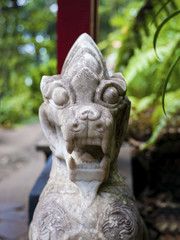 Asian stone dragon in garden.