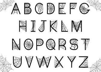 Set of letters with spider web