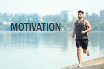 Word MOTIVATION on background. Business trainer concept. Young man running on river shore