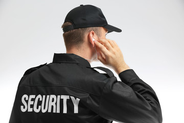 Male security guard isolated on white