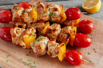 Chicken shish kebab with pepper tomato wooden skewer