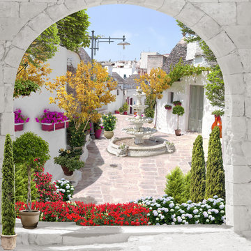 Street view with flowers and fountain, old city