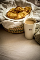 delicious Breakfast in bed with a big sword coffee