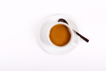 Coffee in cup and saucer on a white background