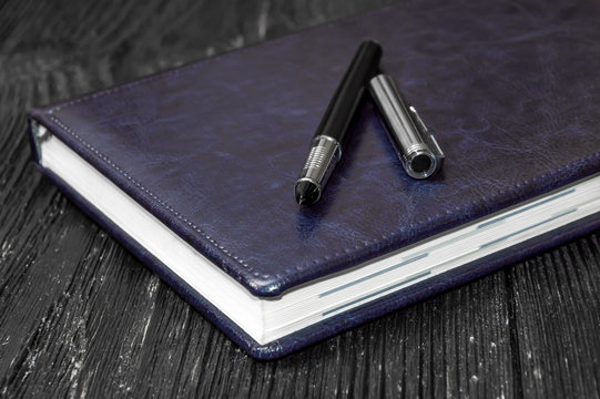 Pen on notebook