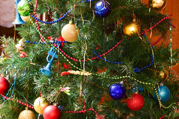 Christmas toys and ornaments on the Christmas tree