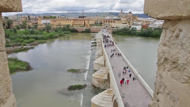 Calahorra Tower overlook on the Roman Bridge, on the Guadalquivir river and Cordoba skyline in Andalusia, Spain.
