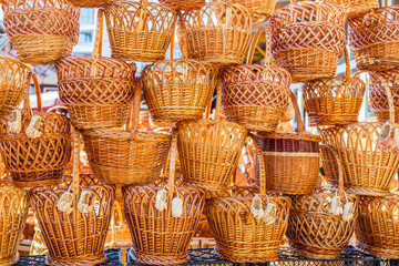 Pile of traditional handmade wicker baskets at street market