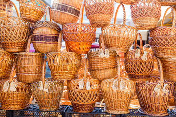 Pile of traditional handmade wicker baskets at street market