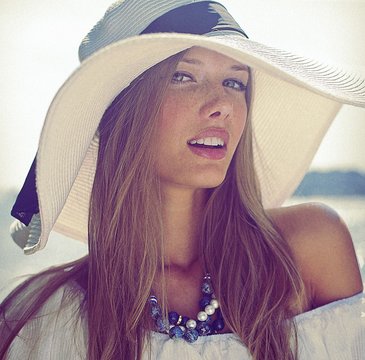 Beautiful girl in white hat