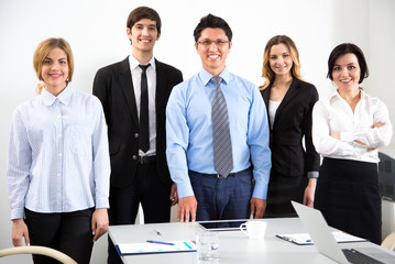 Young businessman with colleagues