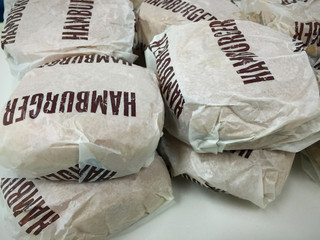 Beef hamburger in paper wrap - 120783370