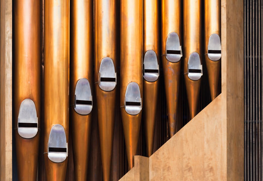 Closeup photo of shining organ tubes