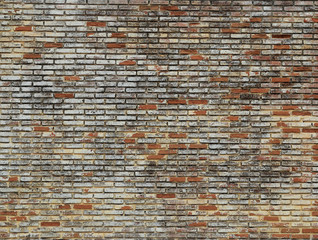 Wall of clay bricks texture background.