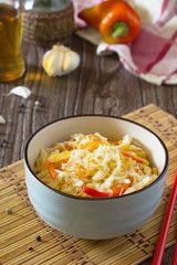 Korean salad of cabbage, carrots, sweet peppers - kimchi in an A