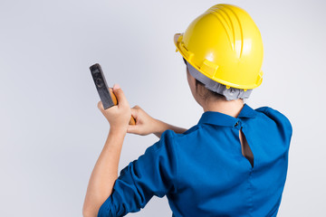 Engineer girl holding a hammer