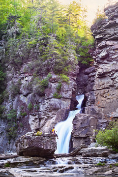 Hiker looking at linville falls, Blue Ridge Parkway, North Carolina, USA