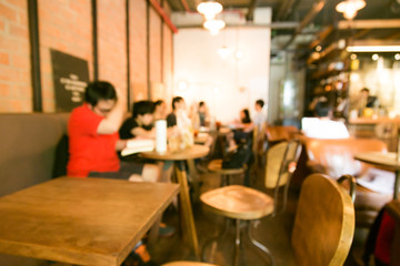 People in Coffee shop blurred background with bokeh light