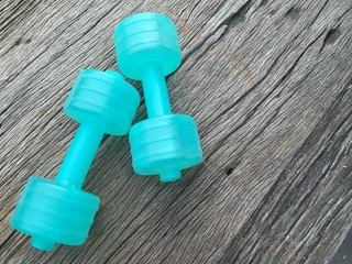 Plastic green dumbbells