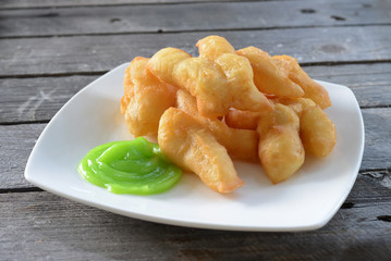 deep-fried dough stick (Patongko) with Pandan custard.
