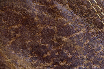 Obraz na płótnie Canvas Brown leather texture closeup