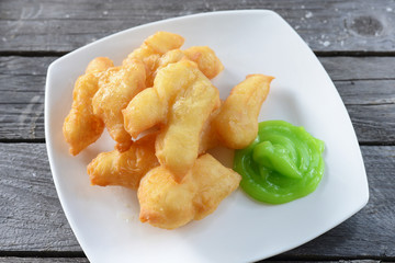 deep-fried dough stick (Patongko) with Pandan custard.
