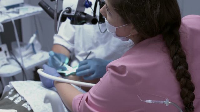 Process of filling of root canals with the help of modern equipment