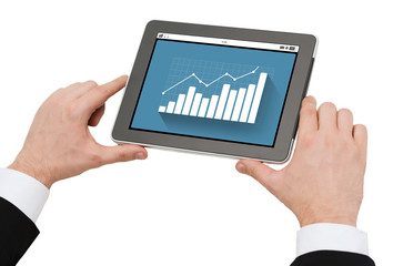 close up of hands holding tablet pc with graph