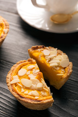 Pumpkin pie with almond slices