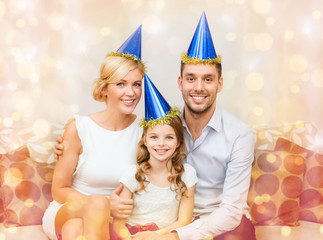 happy family in hats celebrating