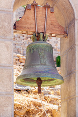 Fototapeta premium Monastery bronze small bell in Spinalonga fortress, Crete